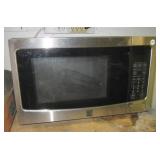 Kenmore microwave oven. Measures 12.5" h x 20.5" Kenmore microwave oven. Measures 12.5" h x 20.5"