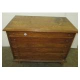 Vintage small wood six drawer cabinet on castors.