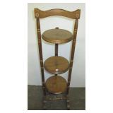 Three tier decorative wood shelf. Measures 36" Three tier decorative wood shelf. Measures 36"