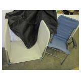 Folding lounge chair and small tarp in a carry