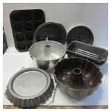 Baking and kitchen items including bundt pans, Baking and kitchen items including bundt pans,