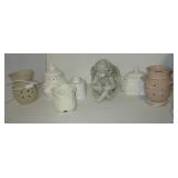 Various votive candle holders, covered ceramic