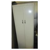Metal two door garage cabinet. Measures 60" h x Metal two door garage cabinet. Measures 60" h x