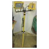Dual halogen model TQS1000 work light on stand. Dual halogen model TQS1000 work light on stand.