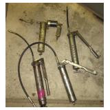(4) Grease guns. (4) Grease guns.