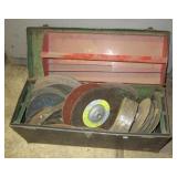 Metal tool box filled with various size sanding