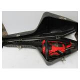 Homelite Super 2 gas chain saw with hard case.