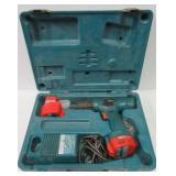 Makita 12 volt battery drill with charger, 2