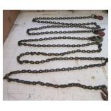 ((2) Chains with hooks. Largest is 10ft Long.