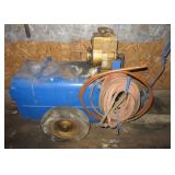 Hudson 1961 portable air compressor with hose.