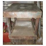 Homemade two tier garage bench on castors. Homemade two tier garage bench on castors.