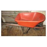 Plastic True Temper wheel barrel. Plastic True Temper wheel barrel.