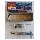 Vintage Passenger Plane friction tin toy. No.