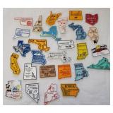 (27) State magnets from various states.
