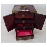 Oriental style jewelry box with metal trim and