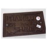 Heavy cast metal Hair Cut and Shave sign.