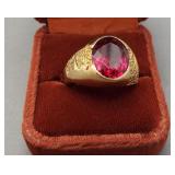 10K Yellow gold ring featuring red stone. Size