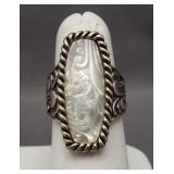 Sterling silver ring with ornate design. Size 7.