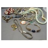 Bag of costume jewelry including necklaces,