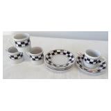Set of (4) Expresso cups and saucers.