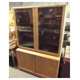 Entertainment center with upper smoky glass doors