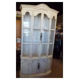 Lighted locking china cabinet with glass doors