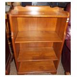 Wood three tier book shelf. Measures 38" h x 24"