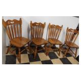 (4) Matching wood dining room chairs.