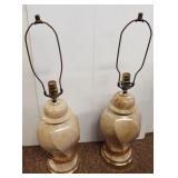Pair of matching ceramic lamp bases with metal