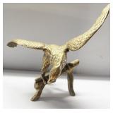Large very heavy brass eagle statue. Measures 24"