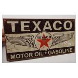 Metal Texaco Motor Oil sign. Measures 8.5" x 16".