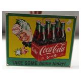 Porcelain 1990 Coca-Cola sign. Measures 8.5" x