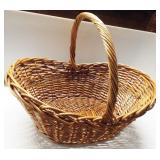 Very large woven basket. Measures 24" tall and