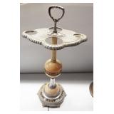 Vintage ashtray stand with chrome finish.