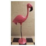 Metal flamingo statue. Measures 60" tall.