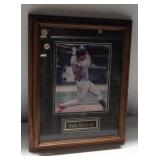 Framed double matted Mark McGwire baseball photo.