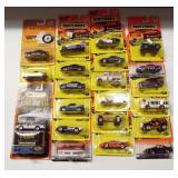(21) New in package Matchbox cars.