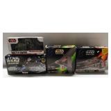 (4) New in package Star Wars collectibles