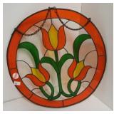 Hanging stained glass picture featuring tulips.