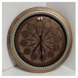 Large battery operated wall clock. Measures 23"