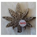 Pot leaf belt buckle with CZ stones.