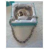 Tiffany chocker necklace. Tag says "Return to