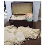 Vintage trunk containing cotton crochet