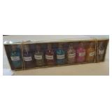 (9) Glass bottles filled with assorted raw