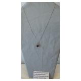 Carefully hand drilled black pearl pendant,