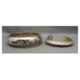 (2) Sterling silver cuff style bracelets of