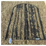 Matching pair of black wrought iron garden gates.