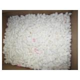 Packing peanuts in box that measures 25" h x 19"