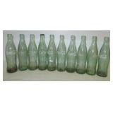 (10) Vintage 12oz Coca-Cola glass bottles.