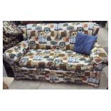 Vintage Nautical themed loveseat with pillows and